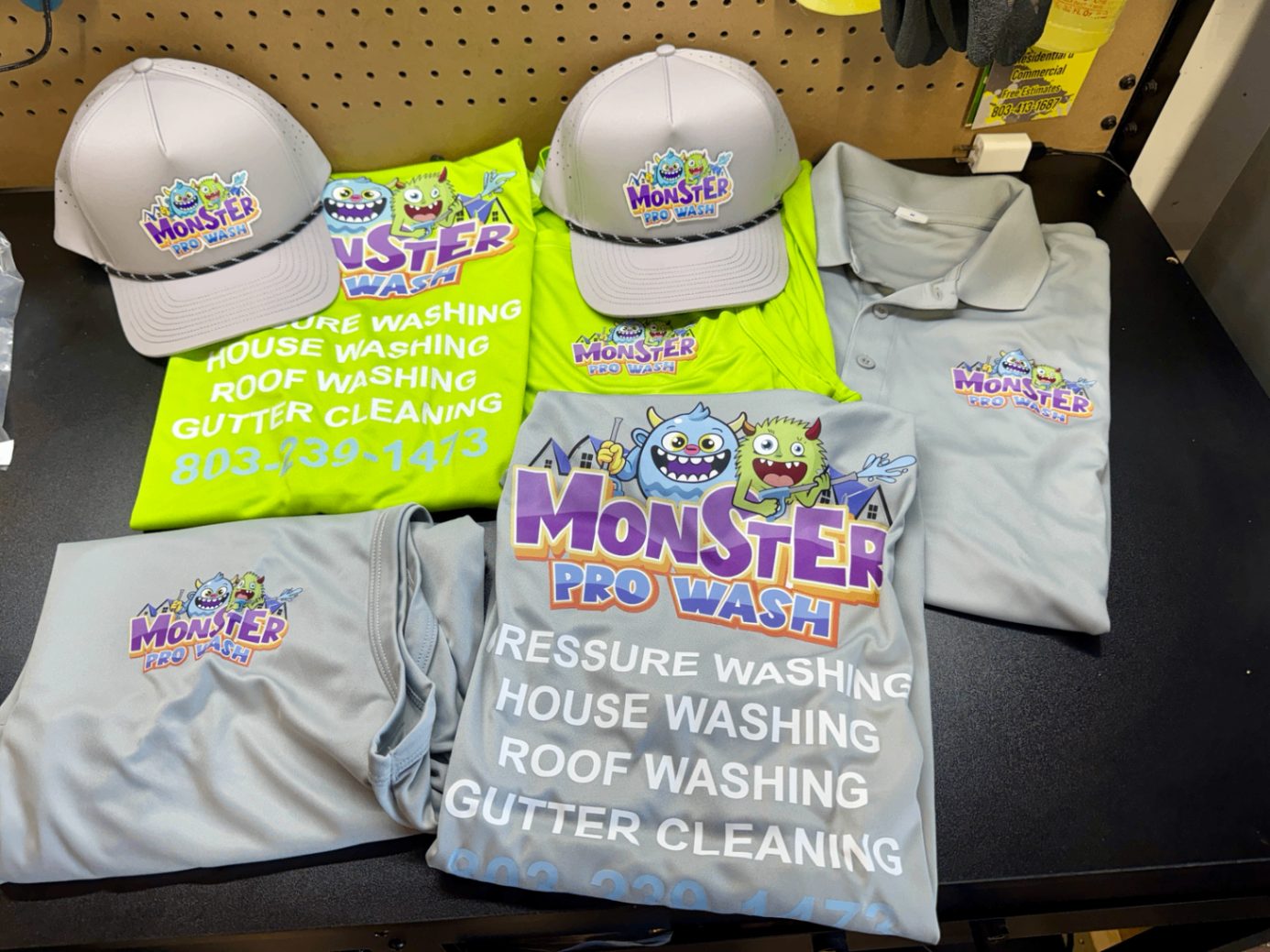Complete branded package for Monster Pro Wash: rope-brim caps with full-color patches, hi-vis safety tees, grey performance polos and printed work shirts